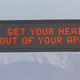 Illustration for article titled Utah Has Street Signs Telling You To Get Your Head Out Of Your Apps